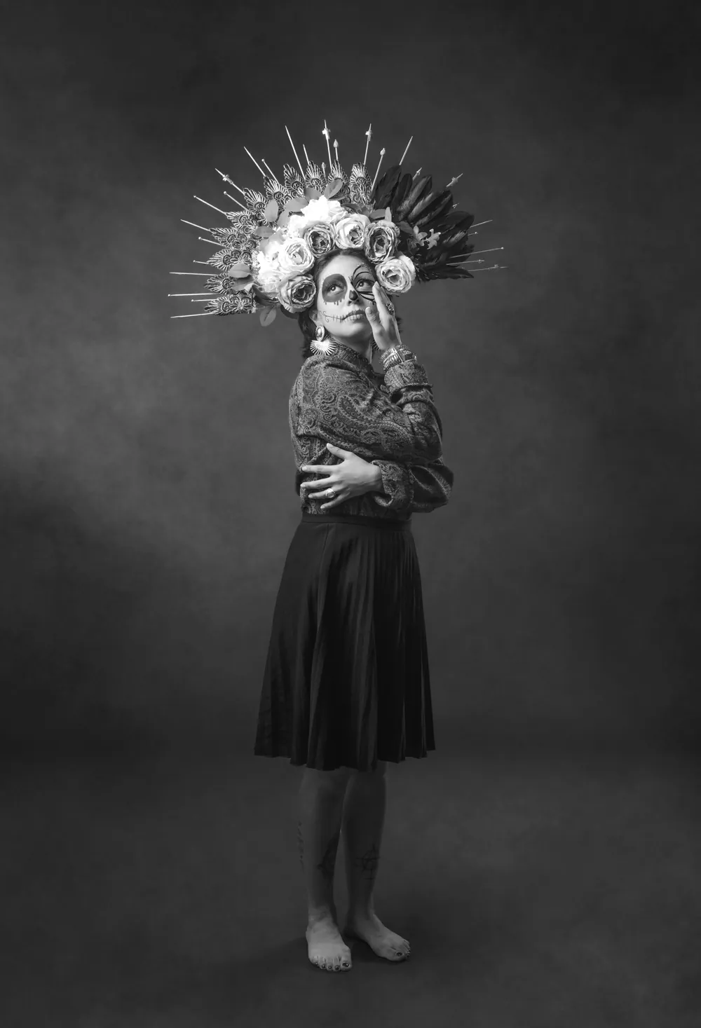 Sample series still — a full-length costume portrait, treated monochrome