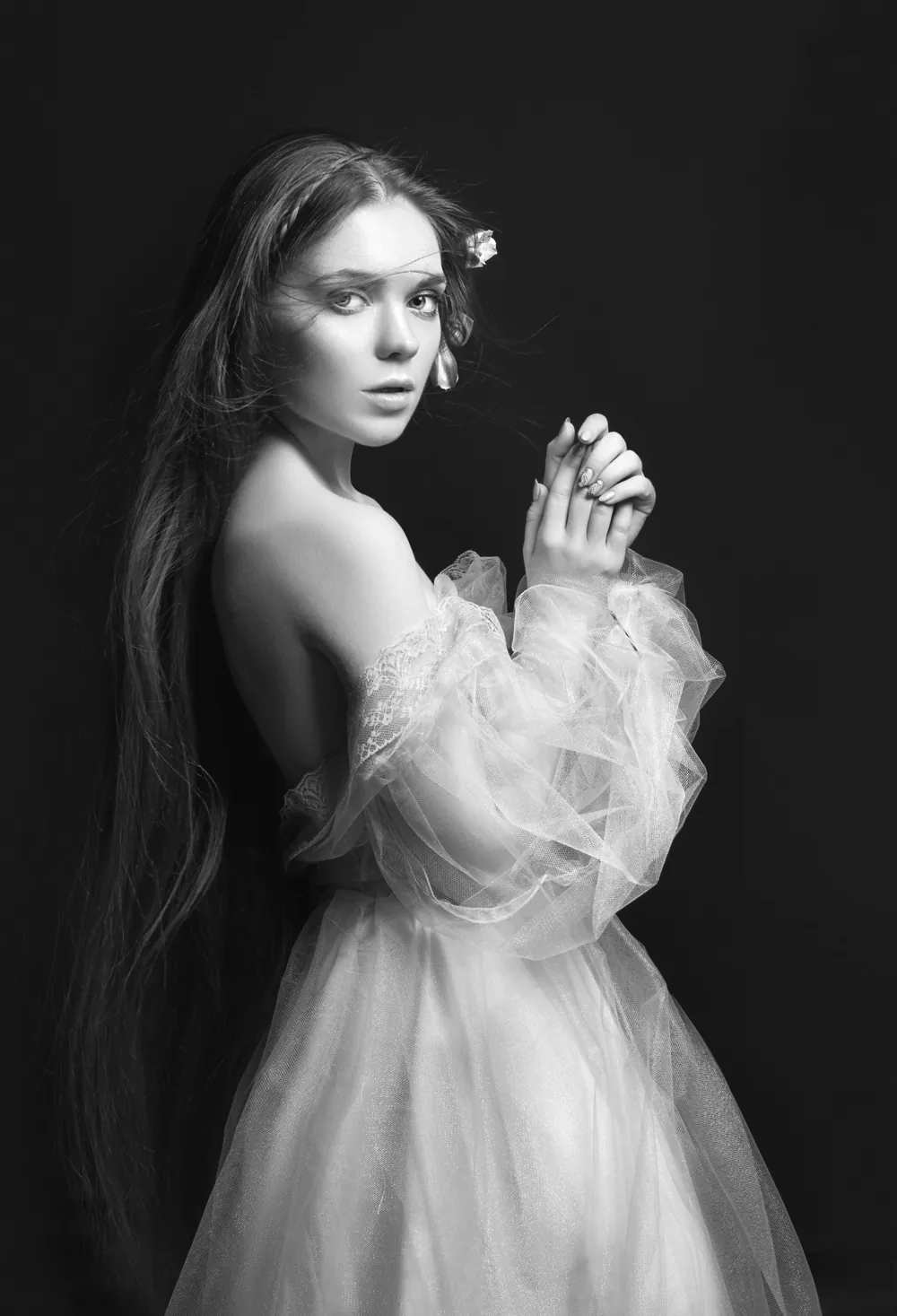 Sample series still — a fine-art portrait in soft light, treated monochrome