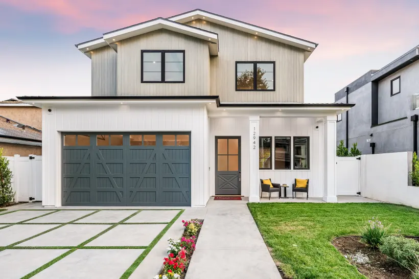 White farmhouse-style home sold in Coronado